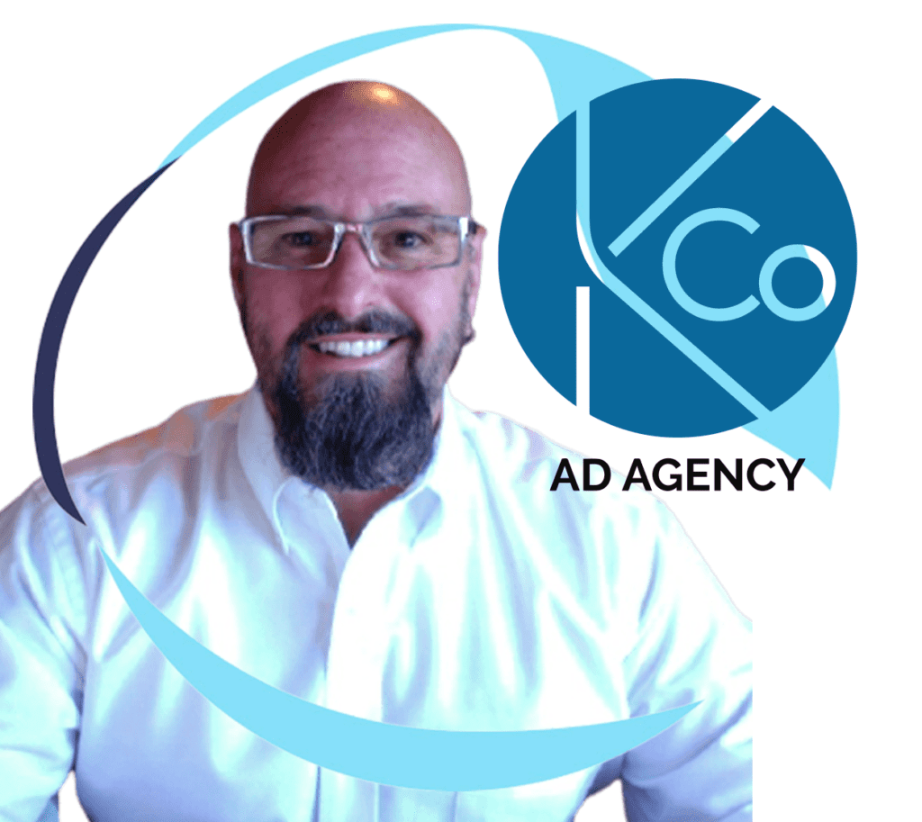 alex alexander of KCo Ad Agency with graphics